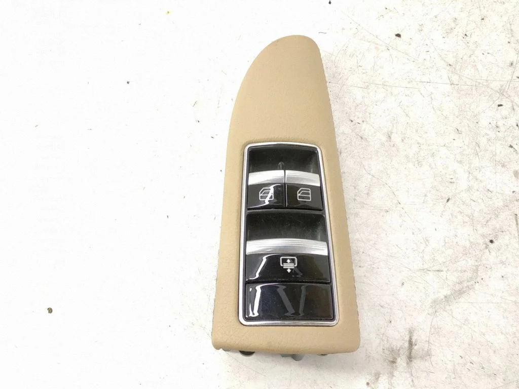 Electric window control switch – rear left