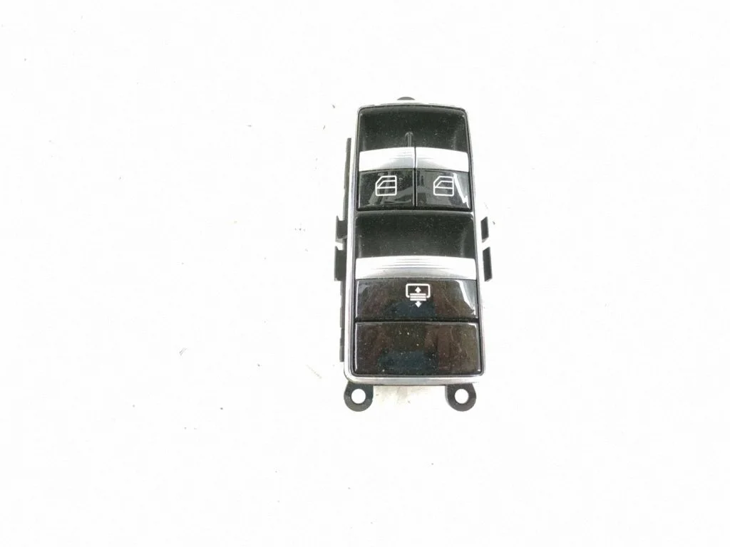 Electric window control switch – rear left