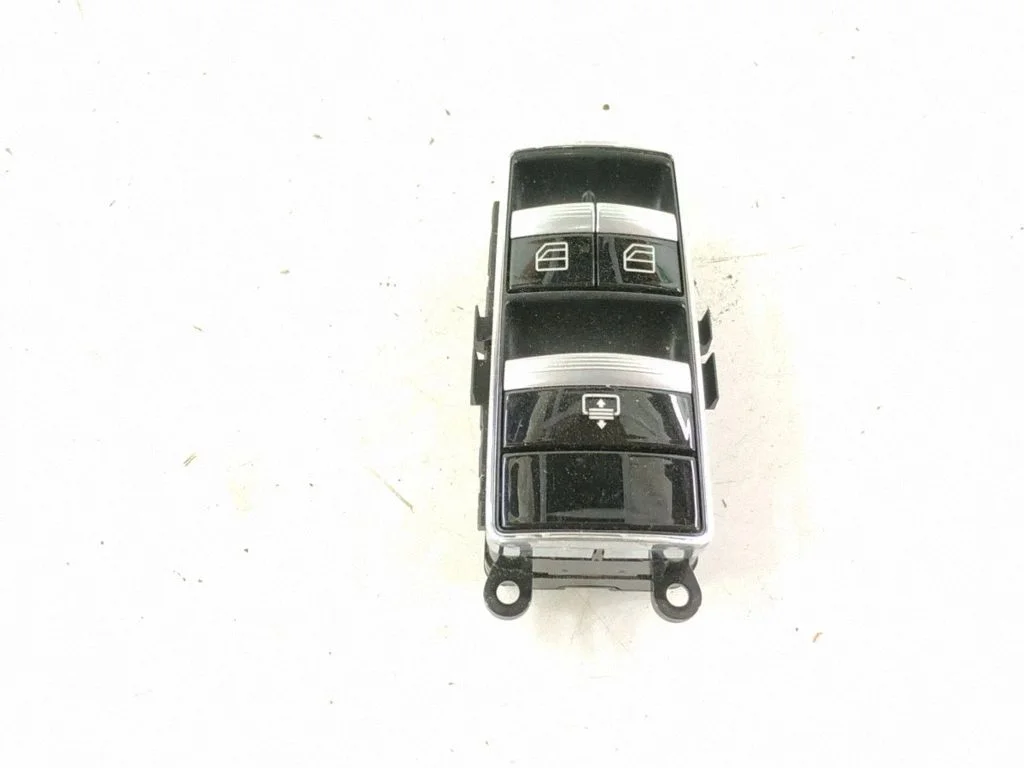 Electric window control switch – rear right