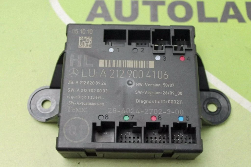 Durvju elektronikas vadības bloks – aizmugurējā kreisā