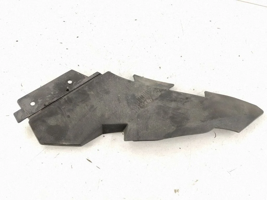 Under headlight/headlamp trim – left