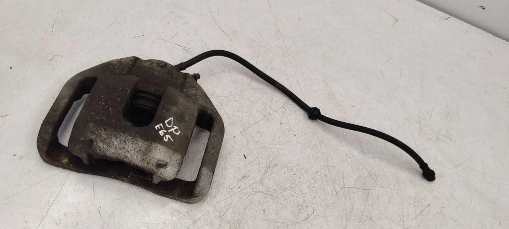 Front brake caliper – front right