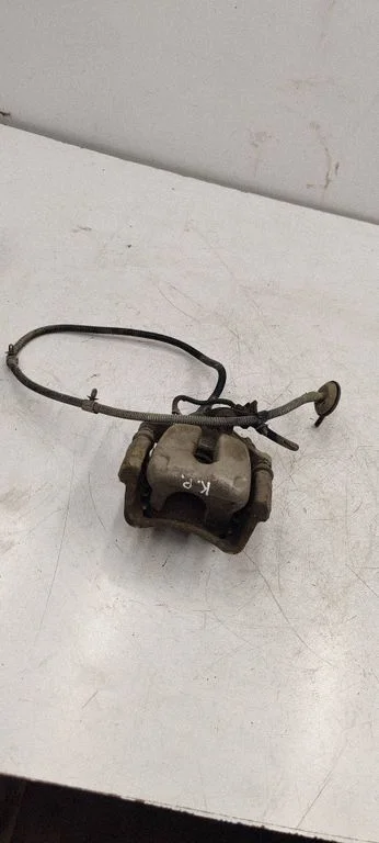 Rear brake caliper – front left