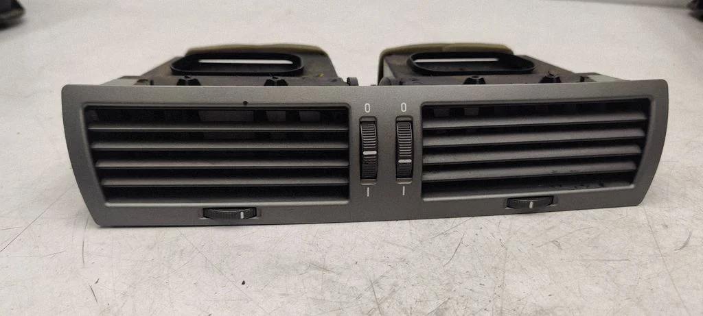 Dash center air vent grill 69112039