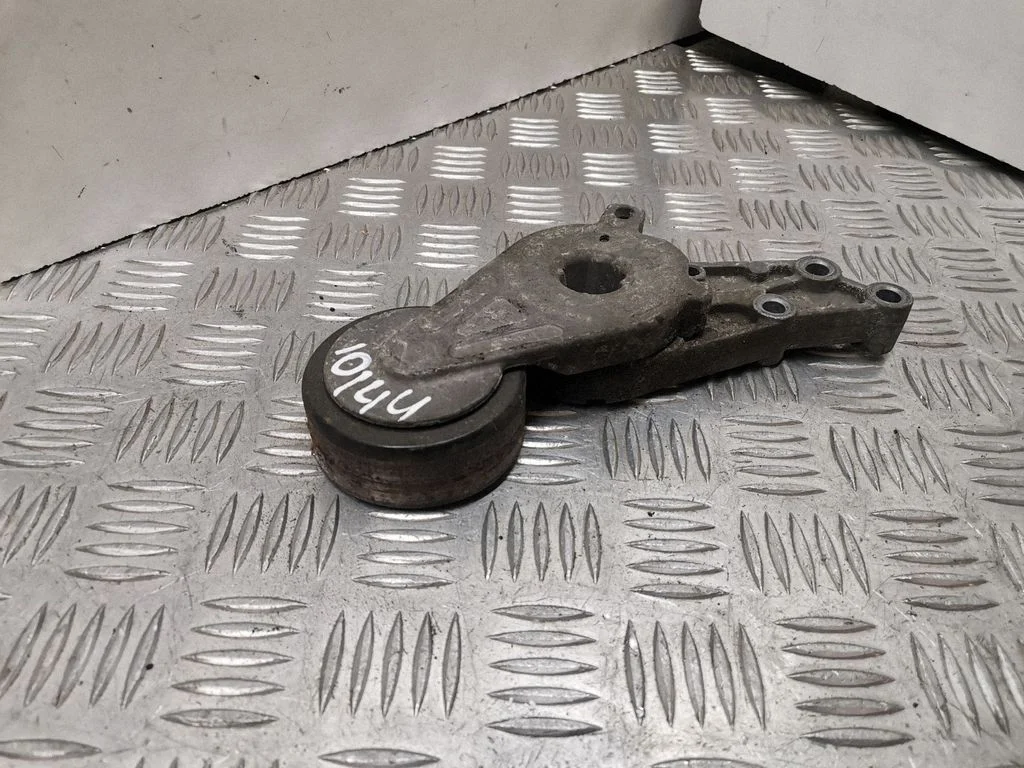 Alternator belt tensioner 06B903133
