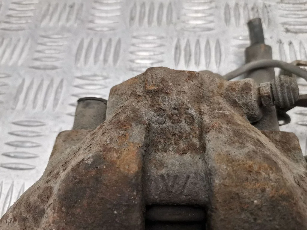 Front brake caliper – front left