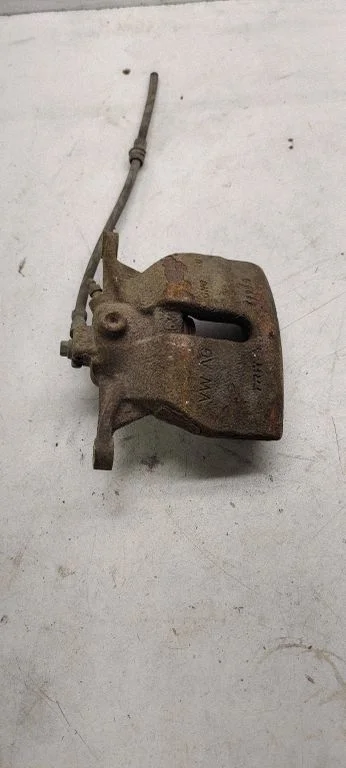 Front brake caliper – front left
