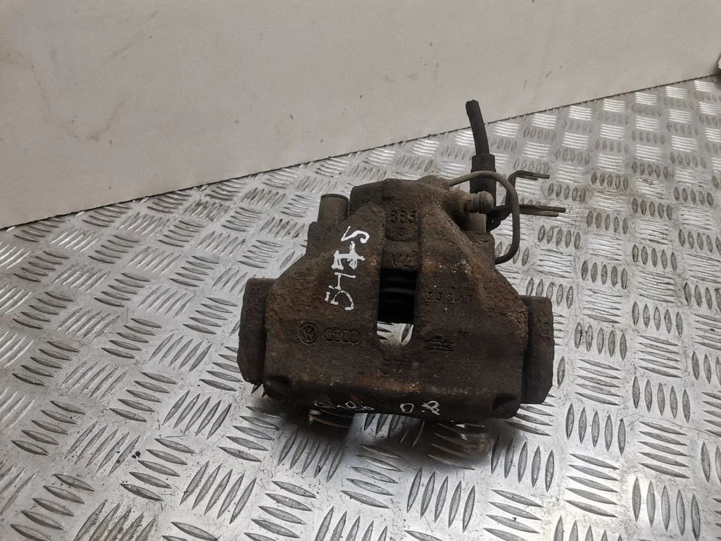 Front brake caliper – right