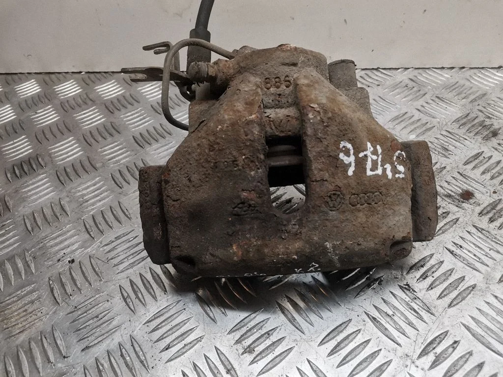 Front brake caliper – left