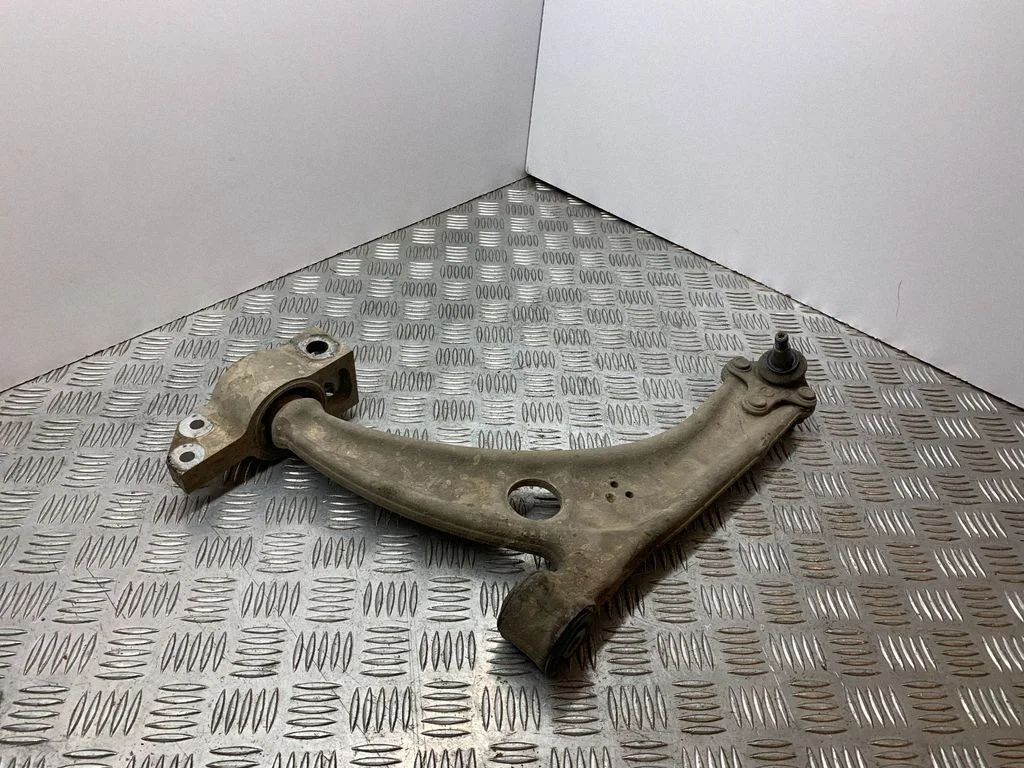 Front lower control arm/wishbone – left