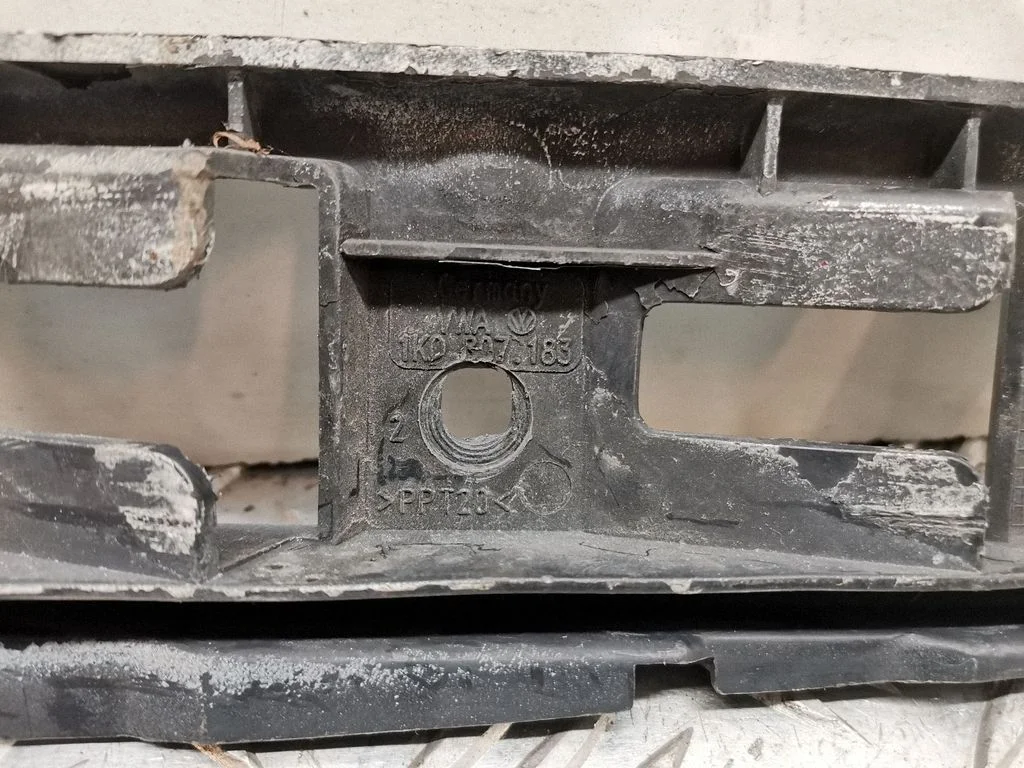 Front bumper mounting bracket 1K0807183