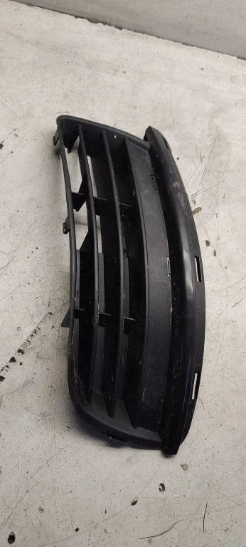 Front fog light trim/grill 1k0853665