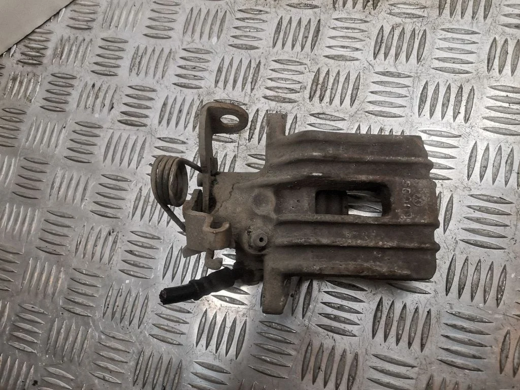 Rear brake caliper – right