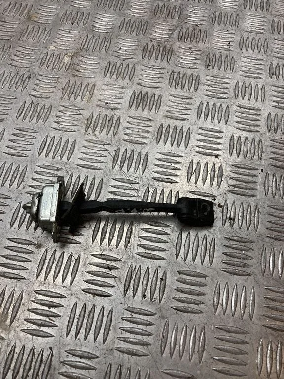 Front door check strap stopper – right