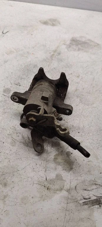 Rear brake caliper – left