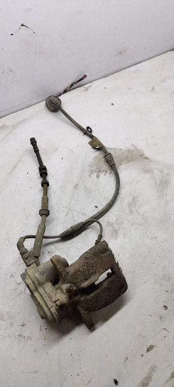 Rear brake caliper – left