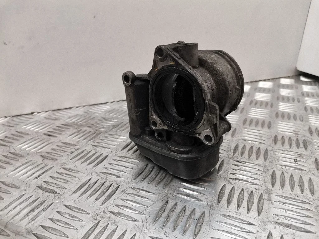 Throttle valve 03G128063B