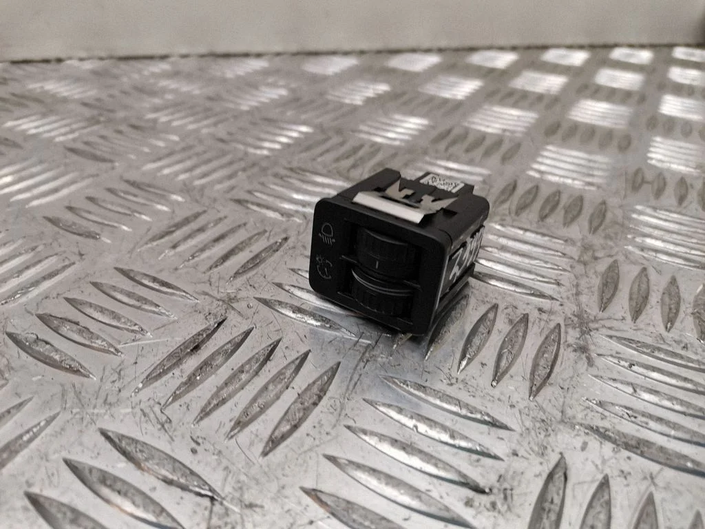 Headlight level height control switch