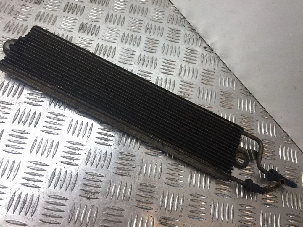 Fuel cooler (radiator) – Volkswagen Passat B6 (2005-2010)