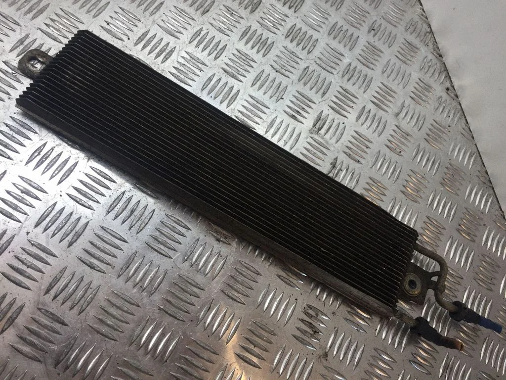 Fuel cooler (radiator) – Volkswagen Passat B6 (2005-2010)