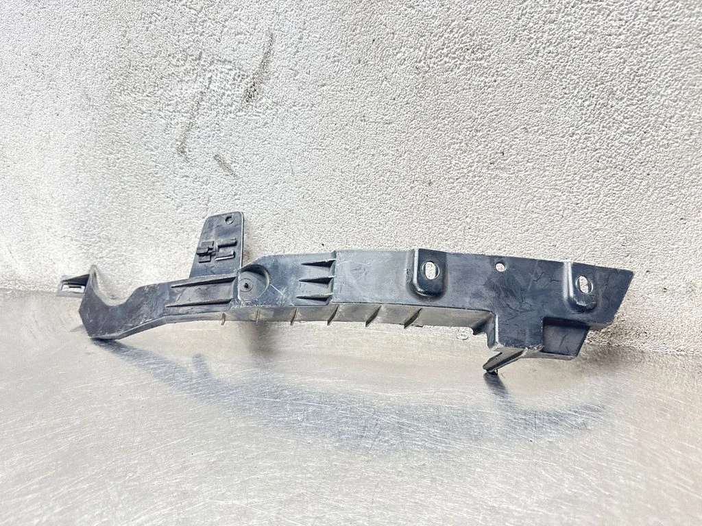 Headlight/headlamp mounting bracket – Opel Astra H (2004-2012)