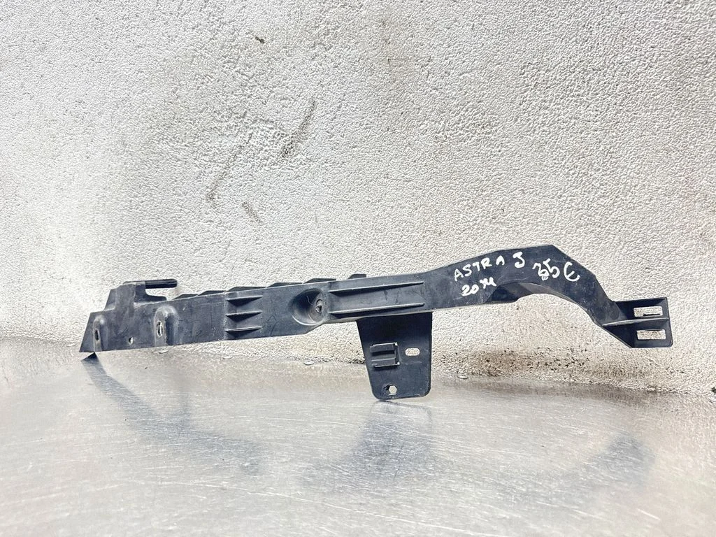 Headlight/headlamp mounting bracket – Opel Astra H (2004-2012)