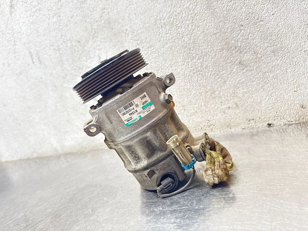Air conditioning (A/C) compressor (pump) – Opel Insignia A (2008-2017)
