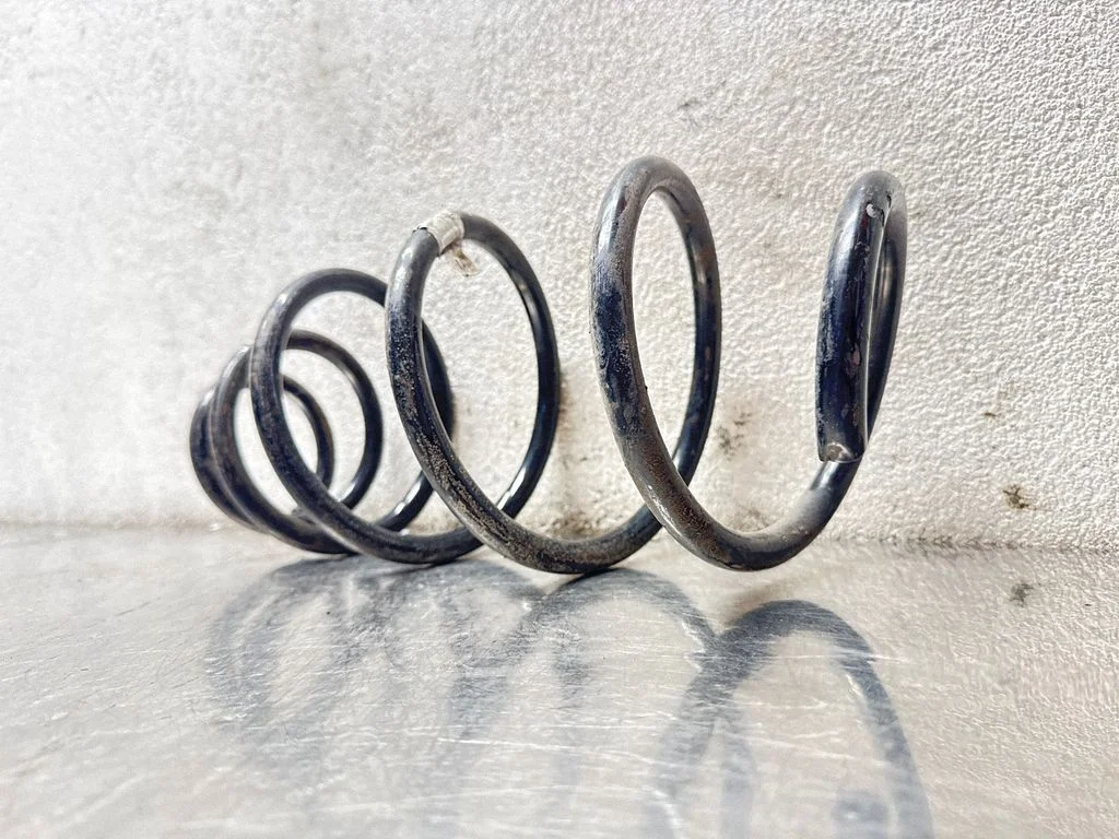 Front coil spring