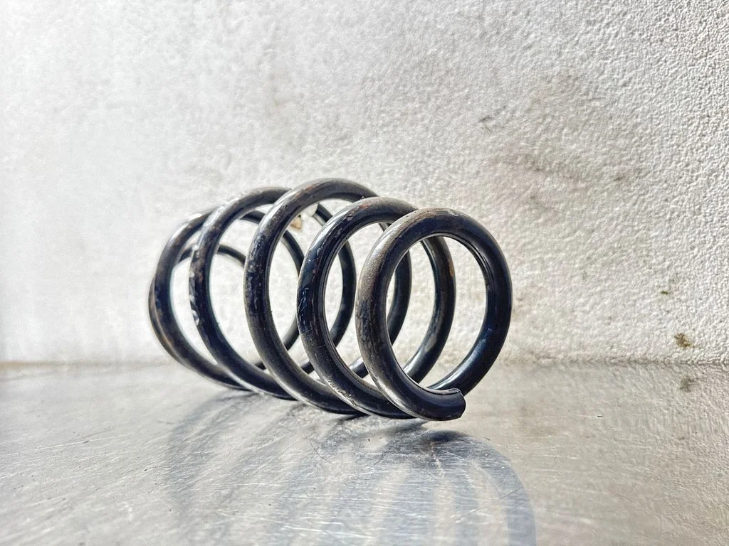 Front coil spring