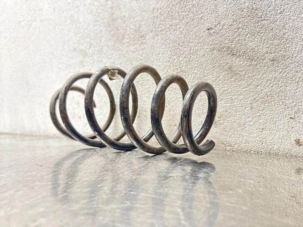 Front coil spring