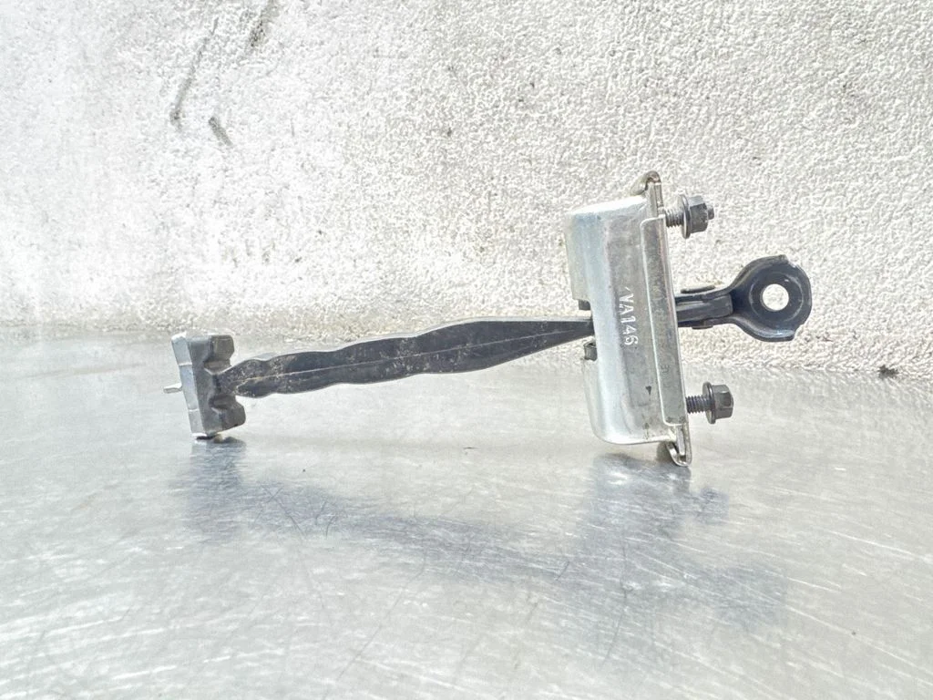 Front door check strap stopper FT4BR23552