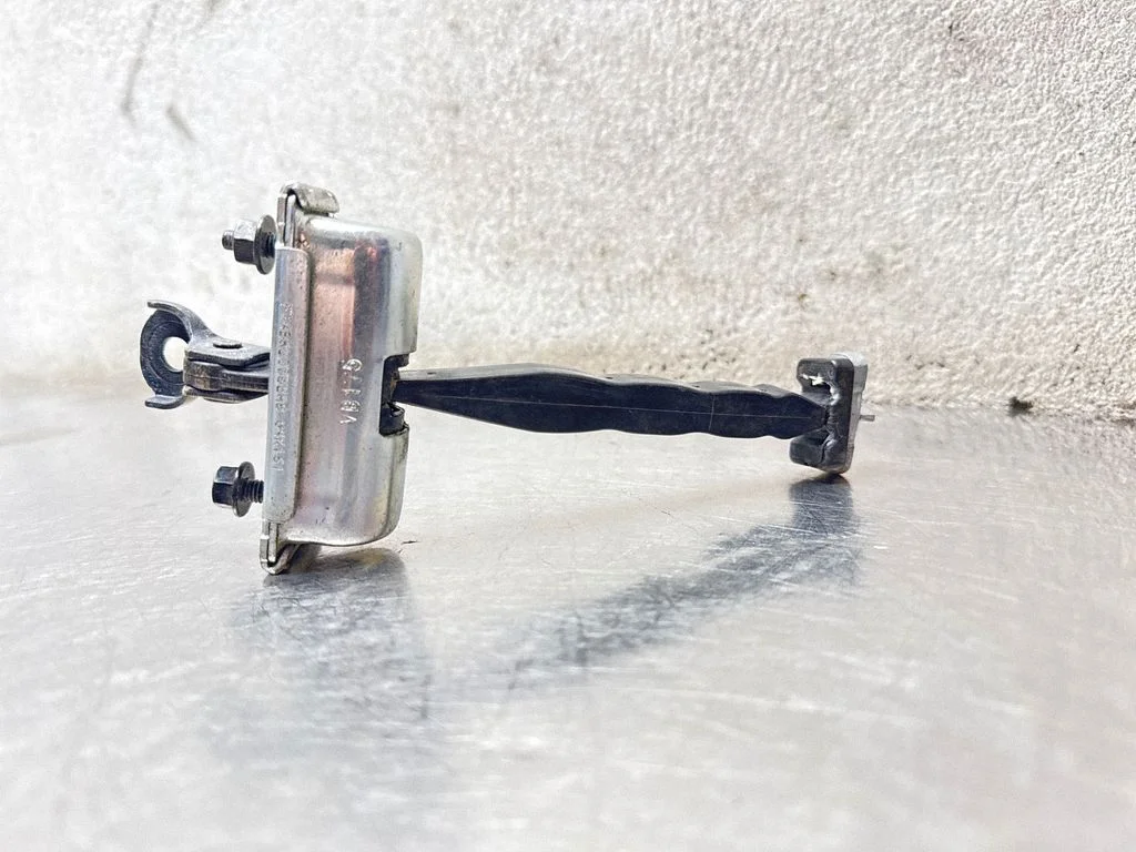 Front door check strap stopper FT4BR23552
