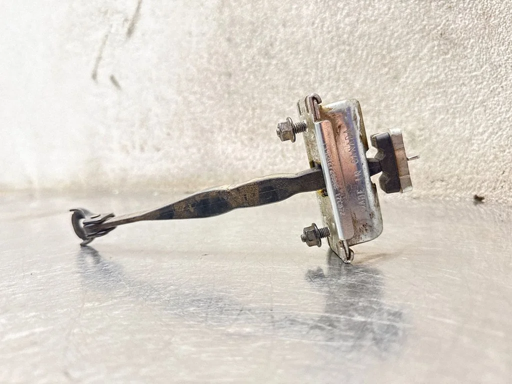 Front door check strap stopper FT4BR27200