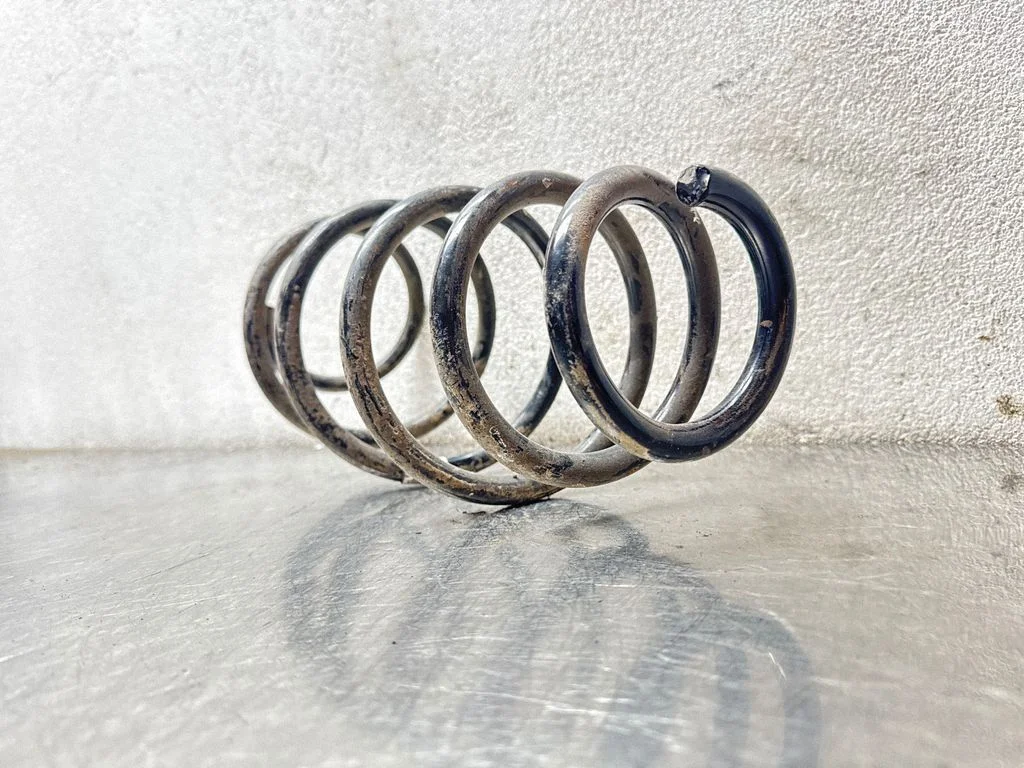 Front coil spring