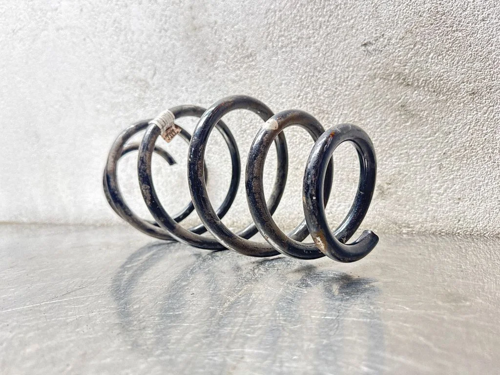 Front coil spring