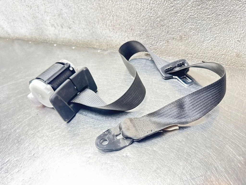 Middle seatbelt (rear) – Opel Astra H (2004-2012)