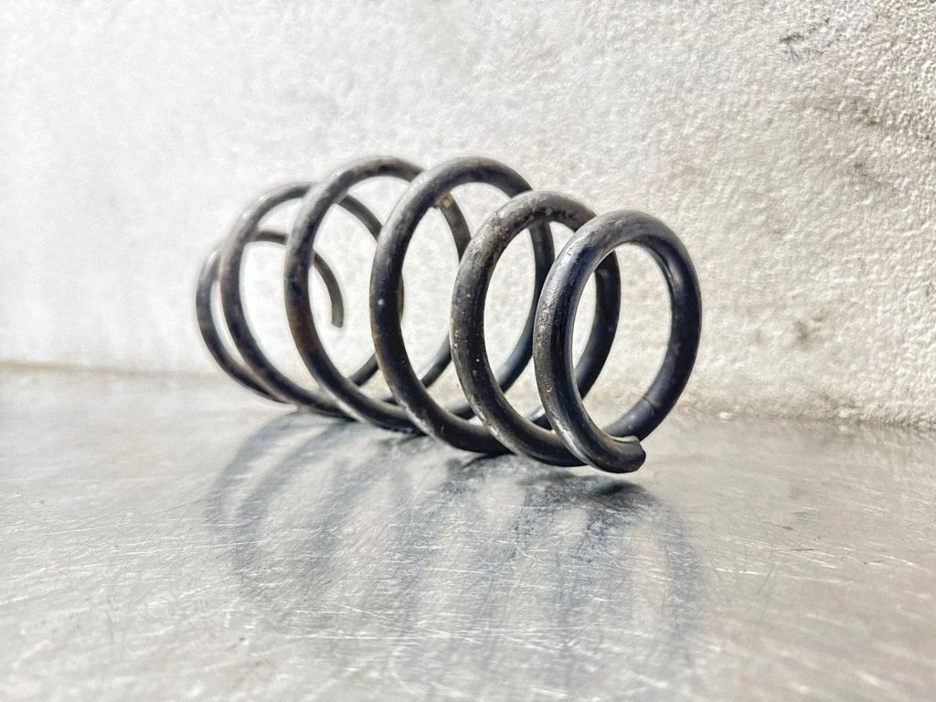 Front coil spring