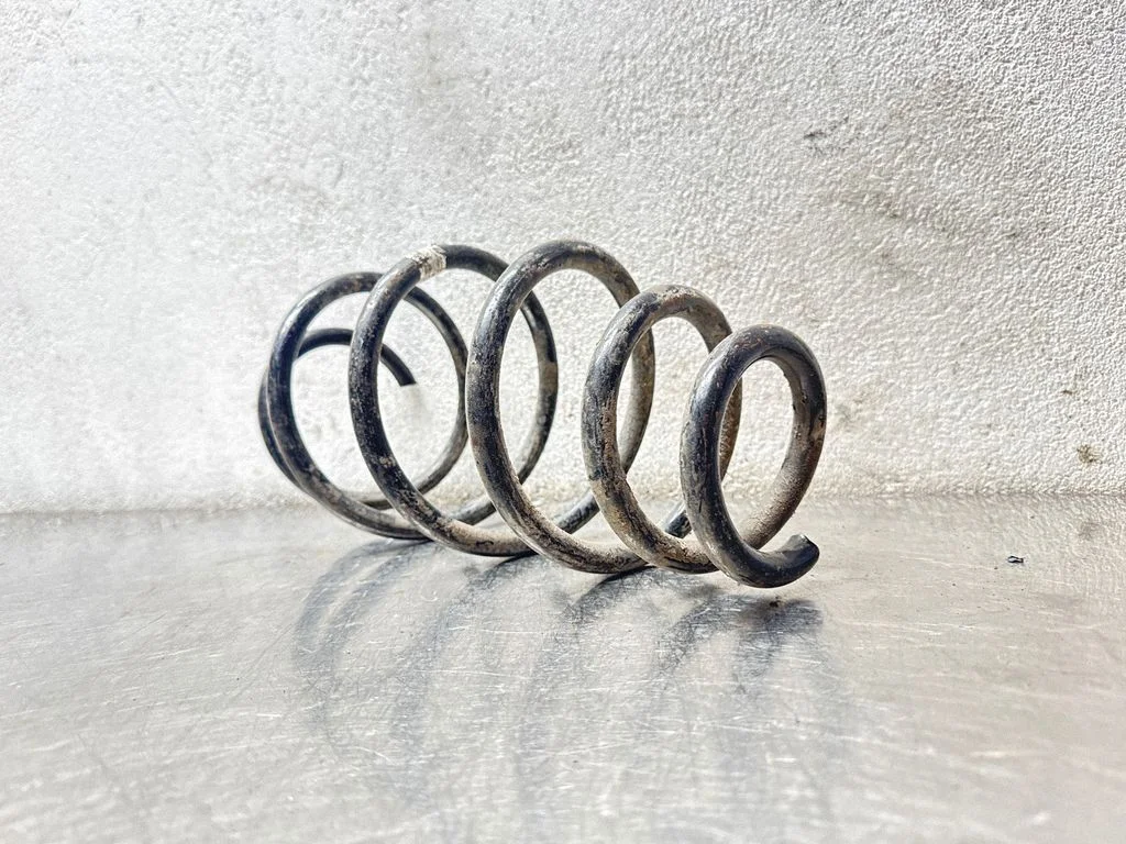 Front coil spring