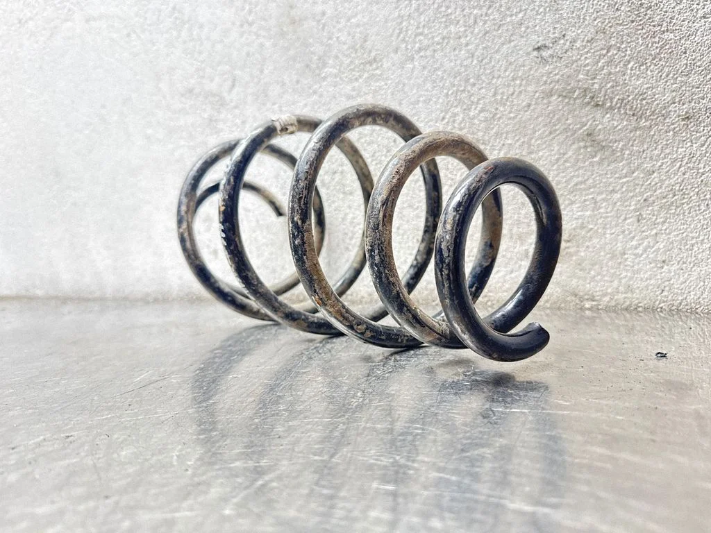 Front coil spring