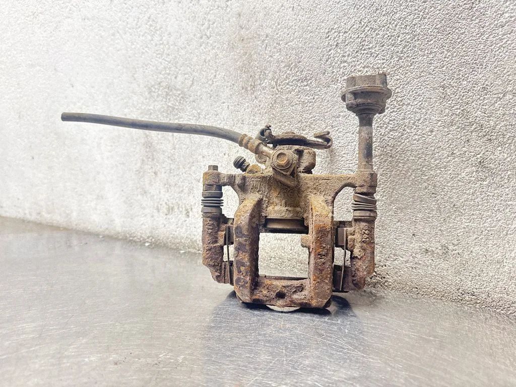 Rear brake caliper – front left