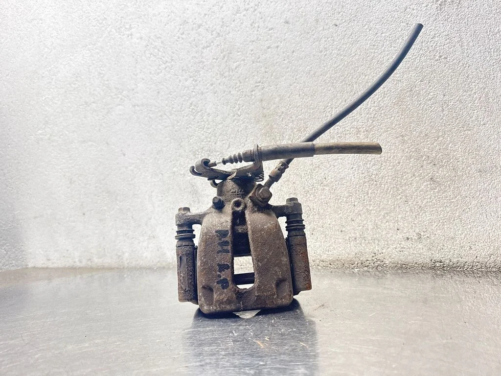 Rear brake caliper – front left