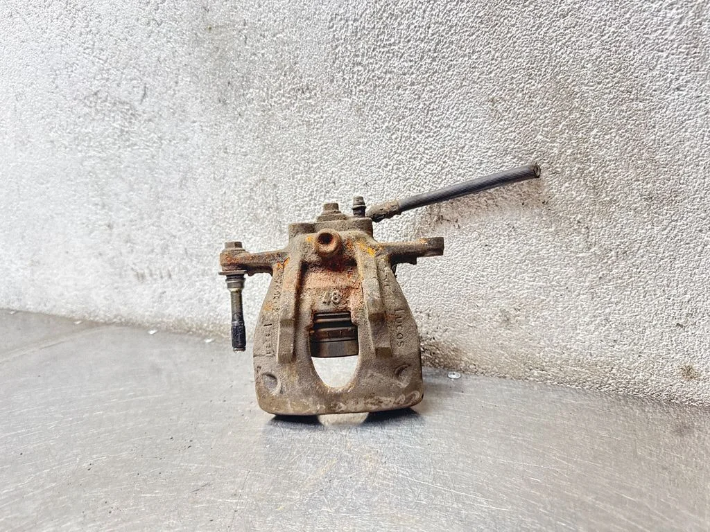 Rear brake caliper – rear left