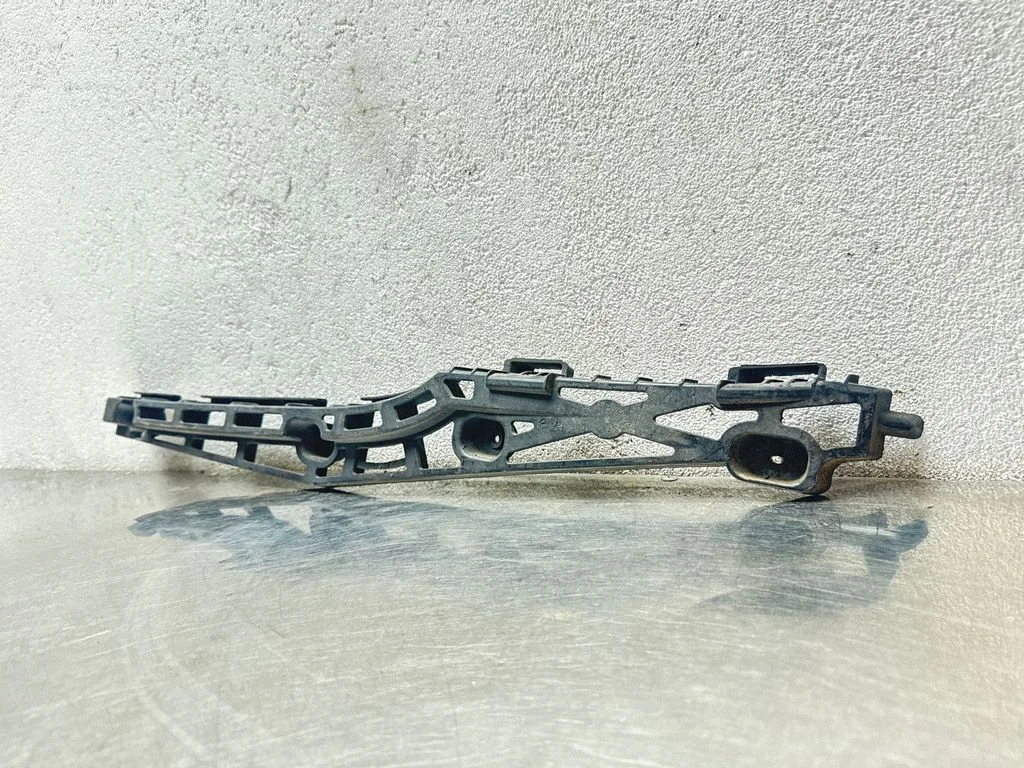 Rear bumper mounting bracket 13238838