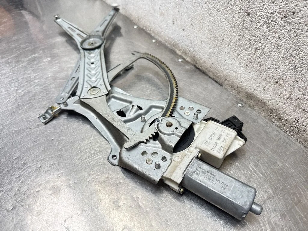 Front door window regulator with motor 9178987