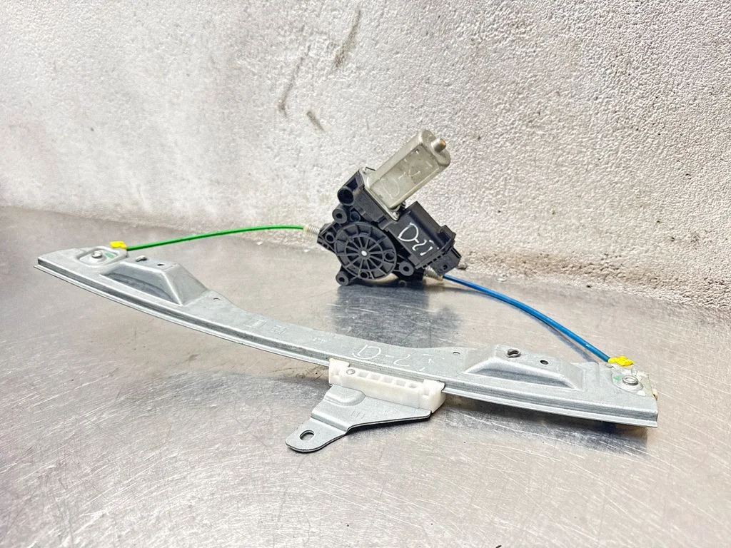 Front door window regulator with motor 1060281