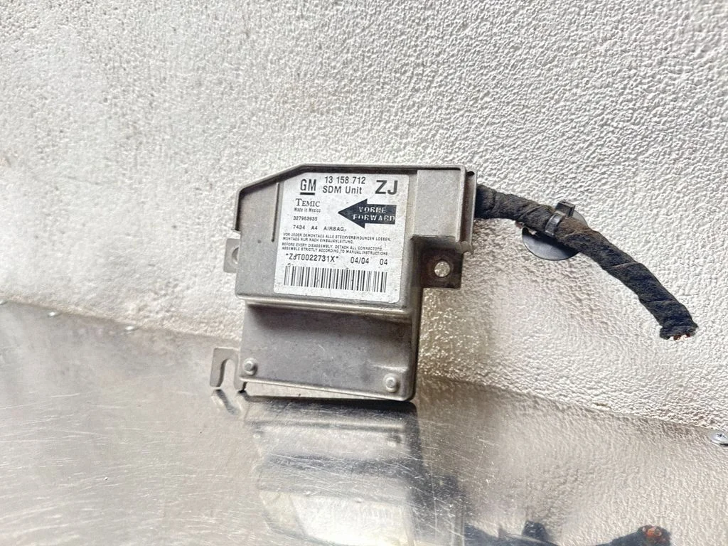 Drošības spilvenu vadības bloks 13158712