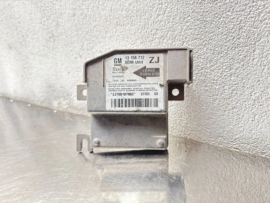 Drošības spilvenu vadības bloks 13158712