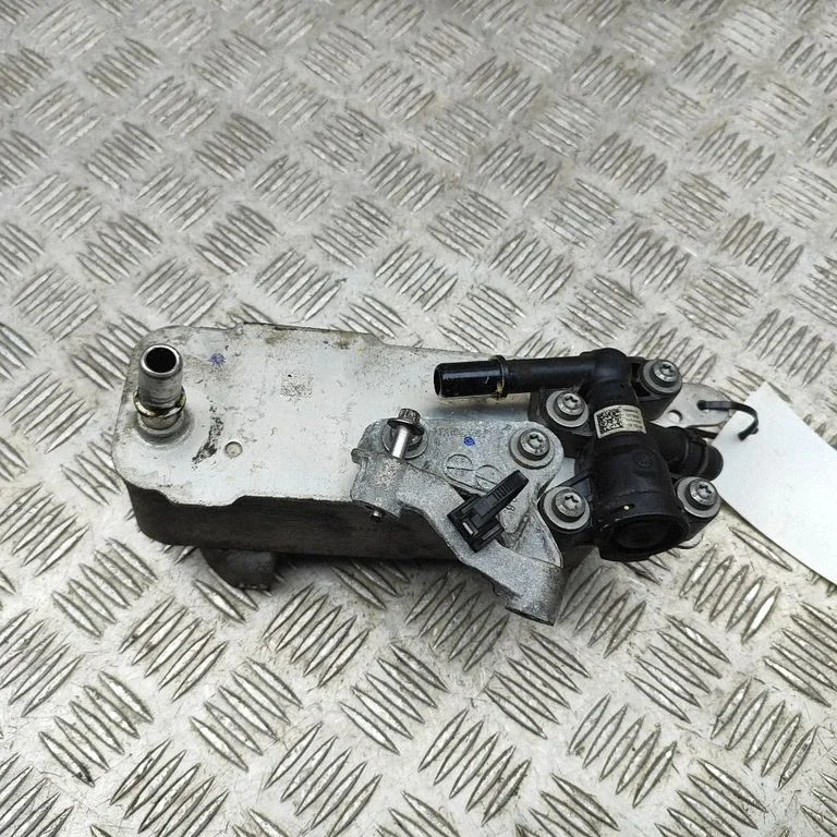 Ātrumkārbas eļļas radiators 8570062