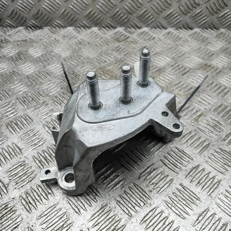 Ātrumkārbas stiprinājuma kronšteins H1BG7M125AB