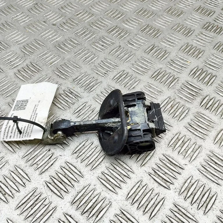 Front door check strap stopper 69877300